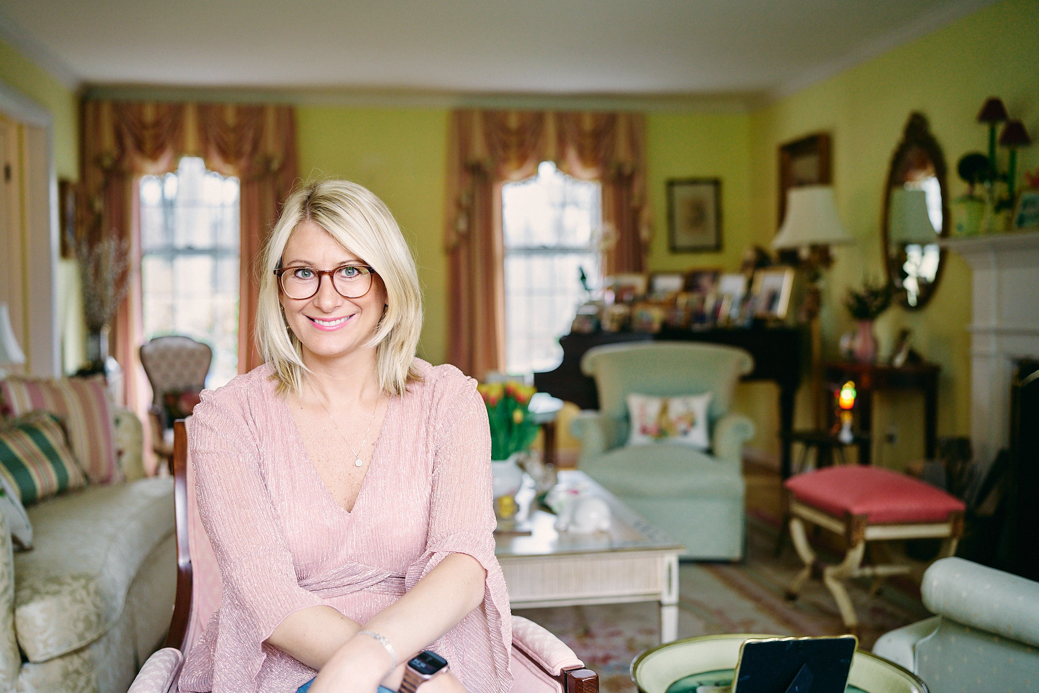 Ali Daggett seated in a living room
